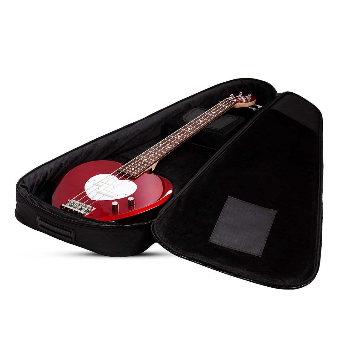 Red electric bass guitar with a heart-shaped body and white pick guard inside a black case on a white background